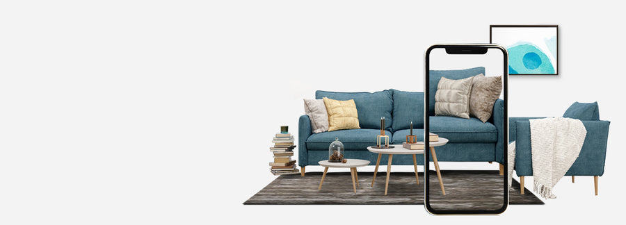 set of blue color sofa & a dark color carpet